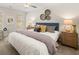Well-lit primary bedroom with two windows and a ceiling fan at 9472 Cedar Grove Ct # 237, Jonesboro, GA 30238