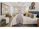 Primary bedroom with natural light, carpet flooring, and stylish decor at 9472 Cedar Grove Ct # 237, Jonesboro, GA 30238