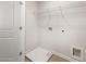 Functional laundry area with shelving and hookups for washer and dryer at 9472 Cedar Grove Ct # 237, Jonesboro, GA 30238
