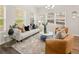 Elegant living room with stylish furniture, large windows, and modern decor at 9472 Cedar Grove Ct # 237, Jonesboro, GA 30238