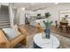 Open-concept living room flows into a modern kitchen, great for entertaining and Gathering time at 9472 Cedar Grove Ct # 237, Jonesboro, GA 30238