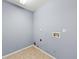 Functional laundry room with tile flooring and utility hookups ready for appliances at 4526 Balto Way, Acworth, GA 30101