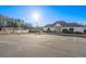 Community clubhouse and parking near the tennis courts. Amenities include tennis courts and convenient parking at 4526 Balto Way, Acworth, GA 30101