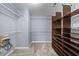 Walk-in closet with carpet and shelving for organized storage at 4526 Balto Way, Acworth, GA 30101