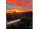 Breathtaking sunset view overlooking the city skyline with vibrant colors painting the sky at 4561 Olde Perimeter Way # 2609, Atlanta, GA 30346