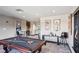 Entertaining game room with a pool table and seating area at 4561 Olde Perimeter Way # 2609, Atlanta, GA 30346