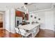Well-lit kitchen with stainless steel appliances, a large island with seating, and stylish decor at 4561 Olde Perimeter Way # 2609, Atlanta, GA 30346