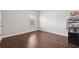 Bedroom with hardwood floors, natural light and neutral paint at 3546 Bridge Walk Dr, Lawrenceville, GA 30044