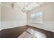 Elegant dining room with coffered ceiling, modern chandelier, and natural light from a large window at 3546 Bridge Walk Dr, Lawrenceville, GA 30044