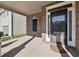 Charming front porch with brick accents and a view of the neighborhood, a cozy entrance at 3546 Bridge Walk Dr, Lawrenceville, GA 30044