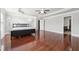 Expansive main bedroom showcases hardwood floors, a tray ceiling, and an en-suite bathroom at 3546 Bridge Walk Dr, Lawrenceville, GA 30044