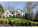 Beautiful home with lush front lawn and landscaping, showcasing its inviting curb appeal at 4555 Mystic Dr, Atlanta, GA 30342