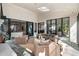 Spacious sunroom with skylights, access to living area, and multiple glass sliding doors at 4555 Mystic Dr, Atlanta, GA 30342