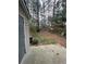 Private backyard featuring a shed surrounded by mature trees at 4807 Hairston, Stone Mountain, GA 30088