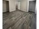 Bedroom with hard surface floors and two walk-in closets at 4807 Hairston, Stone Mountain, GA 30088