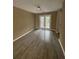 Bright living area showcasing french doors, and modern gray tile at 4807 Hairston, Stone Mountain, GA 30088