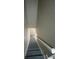 Carpeted staircase with painted wood banister at 4807 Hairston, Stone Mountain, GA 30088