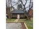 Charming brick home featuring a well-maintained lawn and mature trees in a tranquil neighborhood setting at 4762 Old Highgate Entry, Stone Mountain, GA 30083