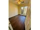 Bedroom boasts hardwood floors and a large window, providing ample natural light at 413 Chippewa Se Dr, Acworth, GA 30102