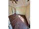 Bedroom with hardwood floors, a ceiling fan, and lots of light from a window at 413 Chippewa Se Dr, Acworth, GA 30102