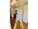 This kitchen contains a black gas range and a full-sized white refrigerator at 413 Chippewa Se Dr, Acworth, GA 30102