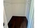 Walk-in closet with hardwood floors and wire shelving offers ample storage space at 413 Chippewa Se Dr, Acworth, GA 30102