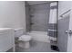 Updated bathroom with walk-in shower, gray tile, and sleek fixtures, plus a modern vanity and toilet at 446 Mcgill Ne, Atlanta, GA 30312