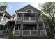 Exterior view of a two-story building featuring balconies and gray siding at 446 Mcgill Ne, Atlanta, GA 30312