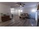 Bright living room featuring a fireplace, gray sofa, and hardwood floors at 446 Mcgill Ne, Atlanta, GA 30312