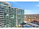 Attractive aerial view of condos, outdoor pool and seating spaces with city views at 923 Peachtree Ne St # 1628, Atlanta, GA 30309