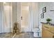 Elegant bathroom with a tub and shower combo, modern fixtures, and decorative wallpaper at 923 Peachtree Ne St # 1628, Atlanta, GA 30309