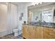 Bathroom featuring granite counters, ample storage, and modern fixtures at 923 Peachtree Ne St # 1628, Atlanta, GA 30309