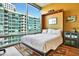 Open Murphy bed for a comfortable sleeping space by a window that highlights the cityscape at 923 Peachtree Ne St # 1628, Atlanta, GA 30309
