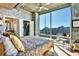Bedroom with walk-in closet, a ceiling fan and a large window offering a city view at 923 Peachtree Ne St # 1628, Atlanta, GA 30309