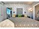 Bedroom featuring neutral colors, modern decor, and a door to a living area at 923 Peachtree Ne St # 1628, Atlanta, GA 30309
