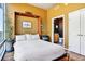 Comfortable bedroom with Murphy bed with an en suite bathroom creating a cozy and convenient living space at 923 Peachtree Ne St # 1628, Atlanta, GA 30309