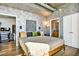 Bedroom featuring neutral colors, modern decor, and an attached bathroom at 923 Peachtree Ne St # 1628, Atlanta, GA 30309