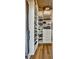 Organized walk-in closet with built-in shelving and drawers at 923 Peachtree Ne St # 1628, Atlanta, GA 30309
