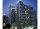 Exterior of the luxurious condo building at night, showcasing modern architecture and city views at 923 Peachtree Ne St # 1628, Atlanta, GA 30309