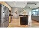 Updated kitchen featuring stainless steel appliances, modern cabinets, and an island at 923 Peachtree Ne St # 1628, Atlanta, GA 30309