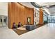 Grand lobby featuring contemporary seating, wood paneling, and elegant lighting at 923 Peachtree Ne St # 1628, Atlanta, GA 30309