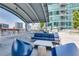 Enjoy the outside lounge area with comfortable seating, outdoor dining, and grilling at 923 Peachtree Ne St # 1628, Atlanta, GA 30309