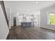 Open-concept kitchen with a large island and modern finishes at 1101 Cooks Farm Way, Woodstock, GA 30189
