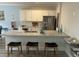 Kitchen featuring white cabinets, stainless steel appliances, and a granite countertop peninsula at 1101 Cooks Farm Way, Woodstock, GA 30189