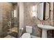 Chic powder room featuring textured wallpaper, and a glass-enclosed shower with bench at 270 17Th Nw St # 2804, Atlanta, GA 30363