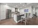 Modern kitchen featuring white cabinetry, stainless steel appliances, and an island with bar seating at 270 17Th Nw St # 2804, Atlanta, GA 30363