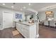 Open-concept kitchen with island and dining area, featuring modern fixtures and finishes at 270 17Th Nw St # 2804, Atlanta, GA 30363