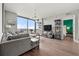 Inviting living room with city view, hardwood floors and modern decor at 270 17Th Nw St # 2804, Atlanta, GA 30363
