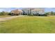 Traditional home with attached garage featuring mature landscaping and large front yard on an expansive lot at 525 Waters Way, Fayetteville, GA 30215
