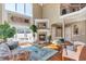 Spacious living room with fireplace, large windows, and a cozy seating area at 525 Waters Way, Fayetteville, GA 30215
